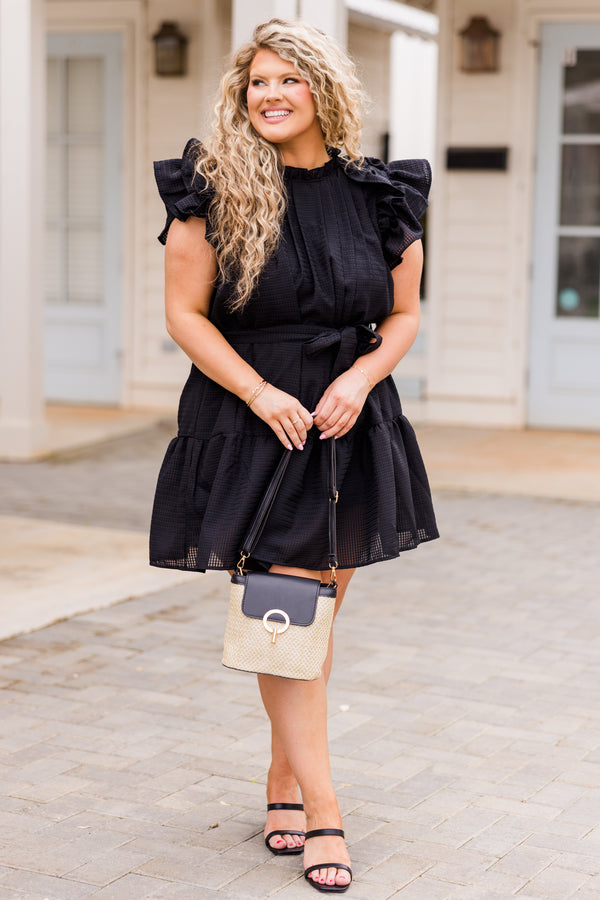 Chic Soul plus size clothing, black dress with ruffles, pleated neckline, and waist tie