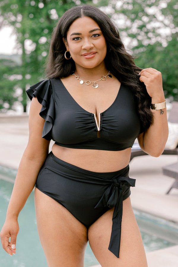 Chic Soul Plus Size Clothing, a black swim top with a gold V detail at center bust and ruffle sleeves