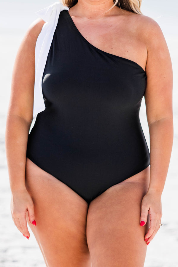 Chic Soul plus size clothing, black one shoulder one piece swimsuit with white bow tie at the top of the strap