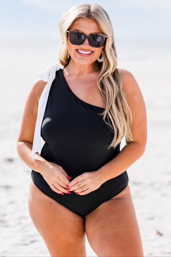 Chic Soul plus size clothing, black one shoulder one piece swimsuit with white bow tie at the top of the strap