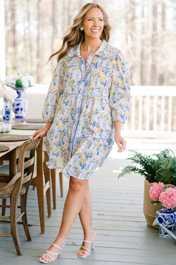 Chic Soul plus size clothing, long-puffed-sleeve purple collared buttoned dress with ruffled detailing and a purple multi-colored floral pattern with a purple lining 