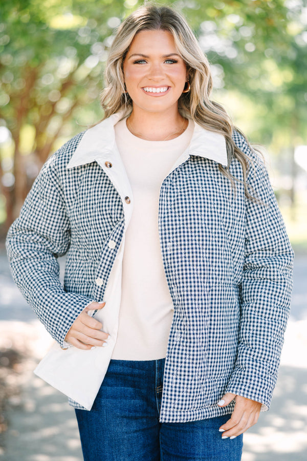 Plus size navy gingham reversible quilted coat with a taupe lining and button front.