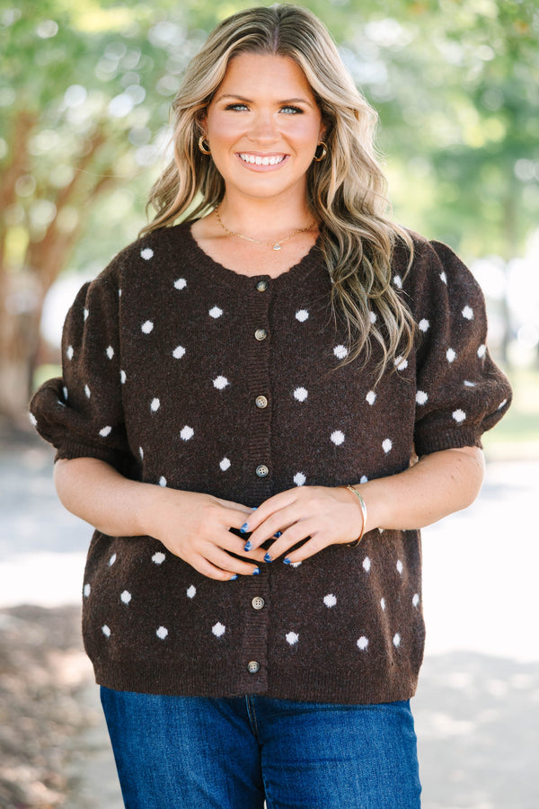 Plus Size brown cardigan with white polka dots, short puff sleeves, and a button-front closure.