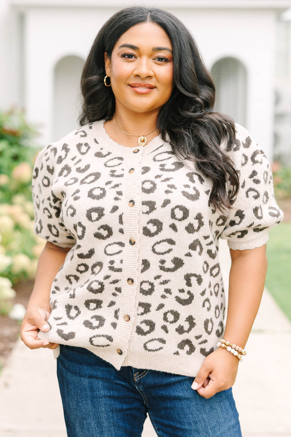 Plus size cream short-sleeve leopard print cardigan with puffy sleeves and front buttons.