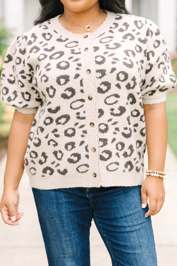 Plus size cream short-sleeve leopard print cardigan with puffy sleeves and front buttons.