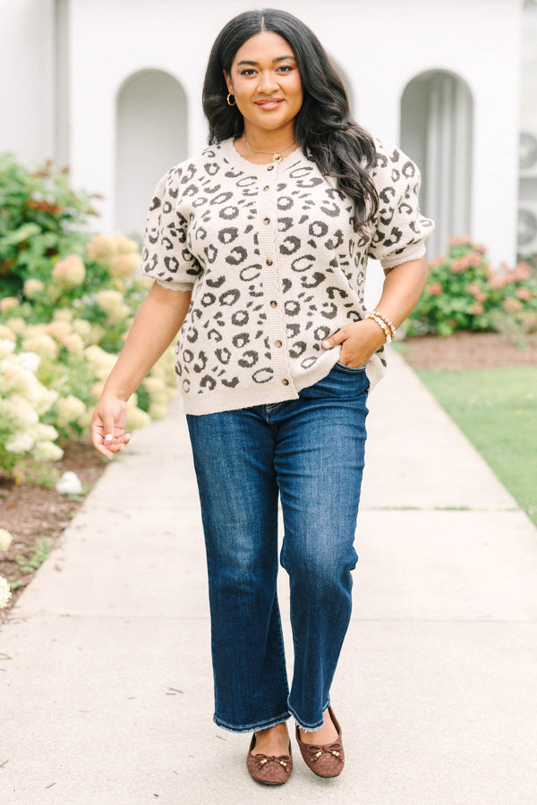 Plus size cream short-sleeve leopard print cardigan with puffy sleeves and front buttons.