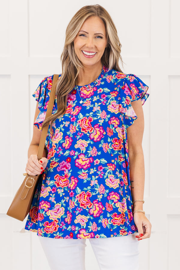 Chic Soul plus size clothing, royal blue short sleeve top with ruffle round neckline with flutter ruffle sleeves with large multicolor pink floral print