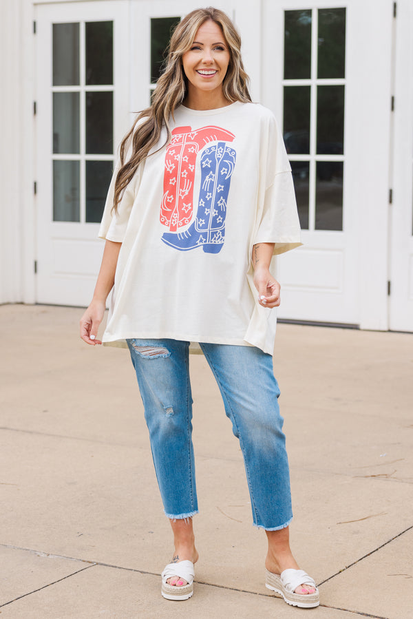 Chic Soul plus size clothing, short sleeve ivory graphic boyfriend tee with an upside down red cowboy boot and a right side up blue cowboy boot