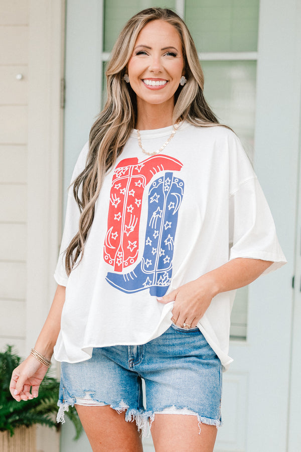 Chic Soul plus size clothing, short-sleeve vintage white wash tee with a high-scoop-neckline and a drop-shoulder with a red and blue graphic of two cowboy boots