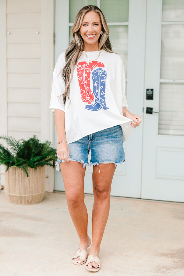 Chic Soul plus size clothing, short-sleeve vintage white wash tee with a high-scoop-neckline and a drop-shoulder with a red and blue graphic of two cowboy boots