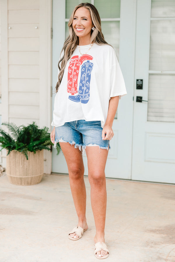Chic Soul plus size clothing, short-sleeve vintage white wash tee with a high-scoop-neckline and a drop-shoulder with a red and blue graphic of two cowboy boots