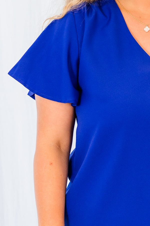 Plus Size cobalt blue V-neck top with short flutter sleeves and a relaxed fit.