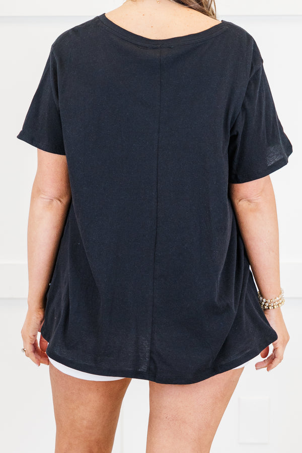Plus Size black v-neck short sleeve cotton tee paired with white denim shorts.