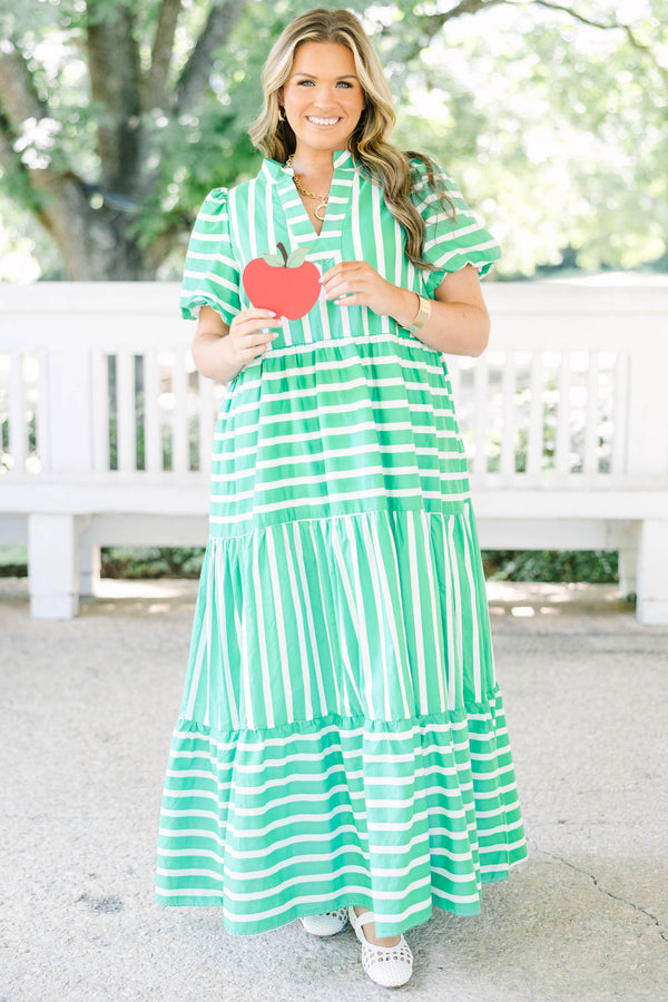 Plus size kelly green and white striped maxi dress with bubble sleeves and v-neckline.