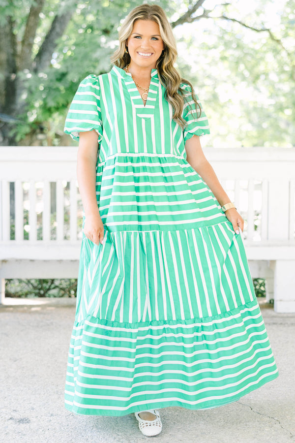 Plus size kelly green and white striped maxi dress with bubble sleeves and v-neckline.
