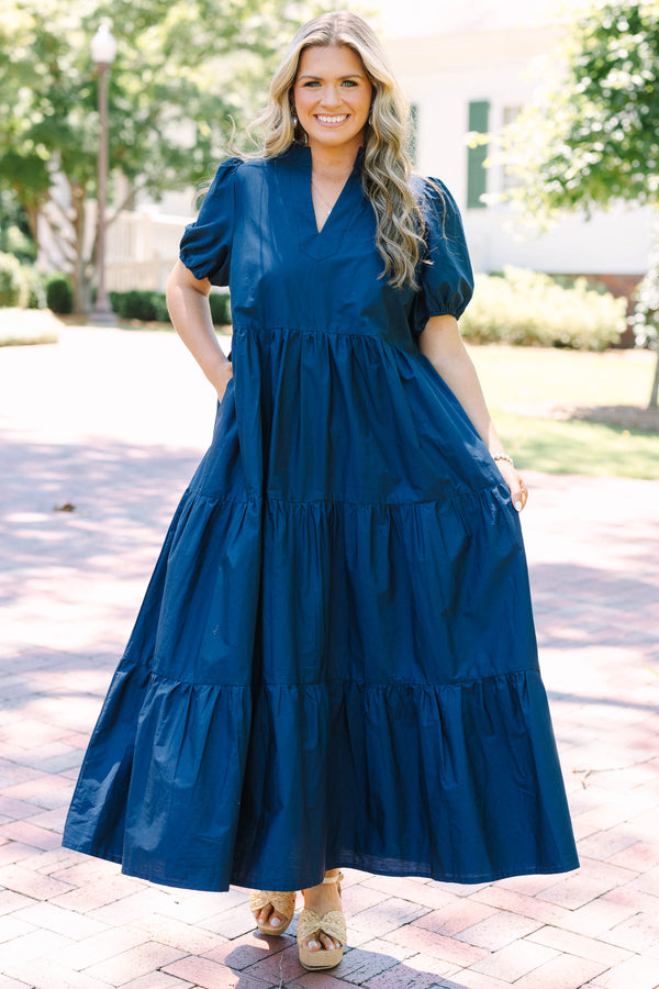 Plus Size deep navy tiered maxi dress with a v-neckline and short puff sleeves.