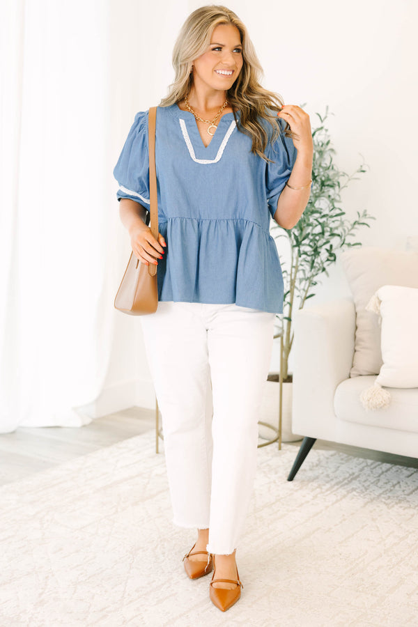 Chic Soul plus size clothing, denim blue short sleeve peplum top with puff sleeves and white detail on sleeves and v neckline 