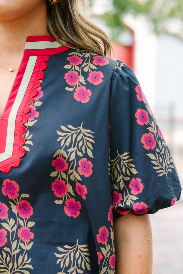 Plus Size black floral cotton top with bubble puff sleeves and a pink scalloped slit V-neckline.