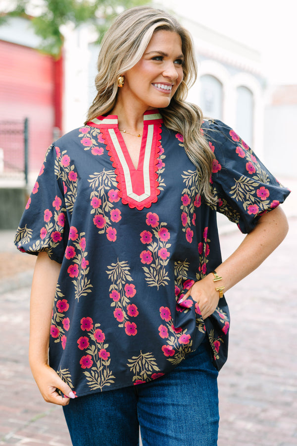 Plus Size black floral cotton top with bubble puff sleeves and a pink scalloped slit V-neckline.