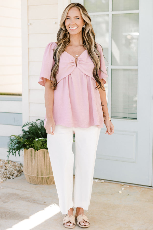 Plus Size dusty pink babydoll top with short flutter sleeves and a v-neckline.