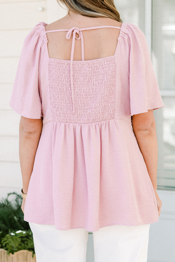 Plus Size dusty pink babydoll top with short flutter sleeves and a v-neckline.