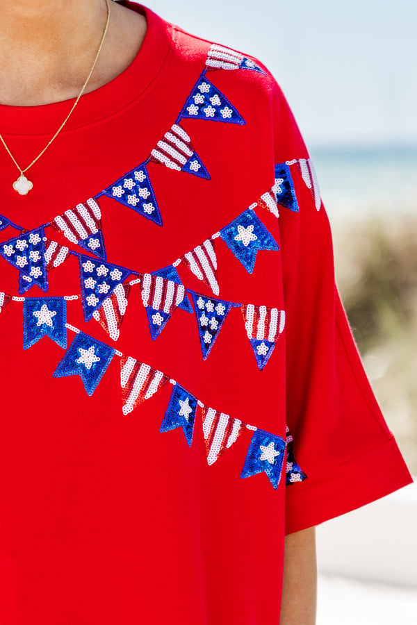Chic Soul plus size clothing, short-sleeve drop-shoulder red top with a high-scoop-neckline with a red white and blue sequined hanging flag graphics across the bodice 