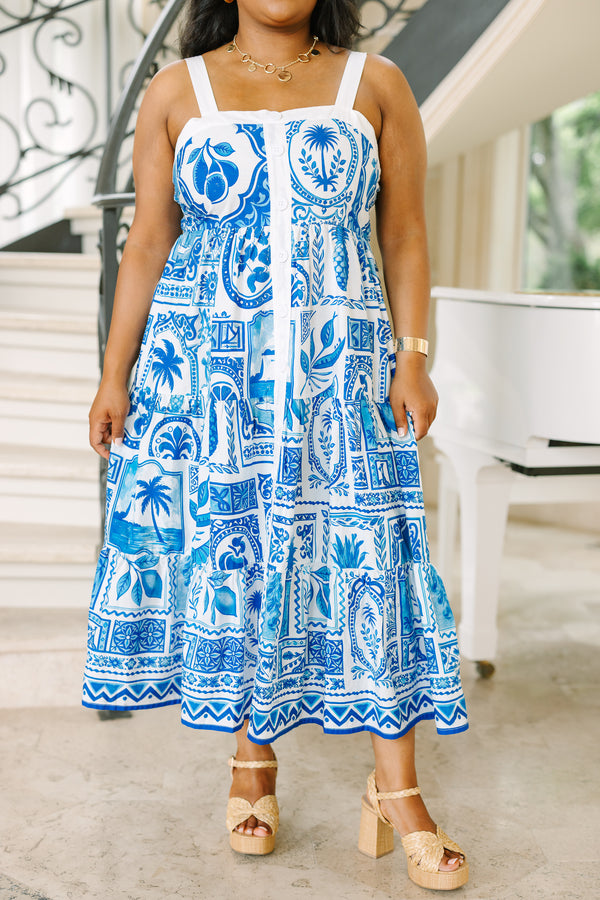 Plus Size blue and white patterned midi dress with a button-down front and tiered skirt.