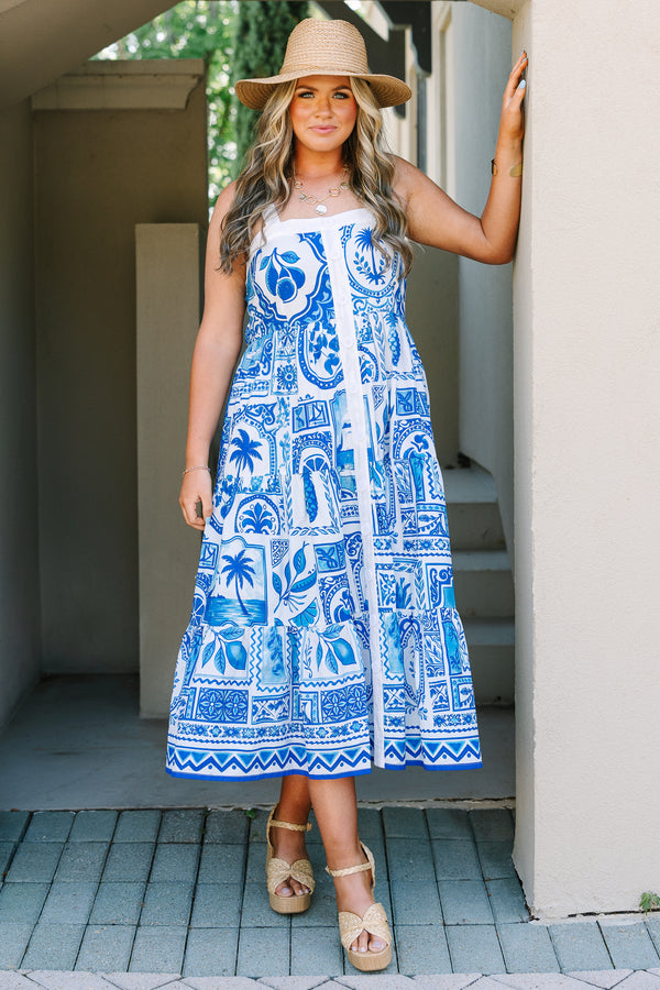 Plus Size blue and white patterned midi dress with a button-down front and tiered skirt.