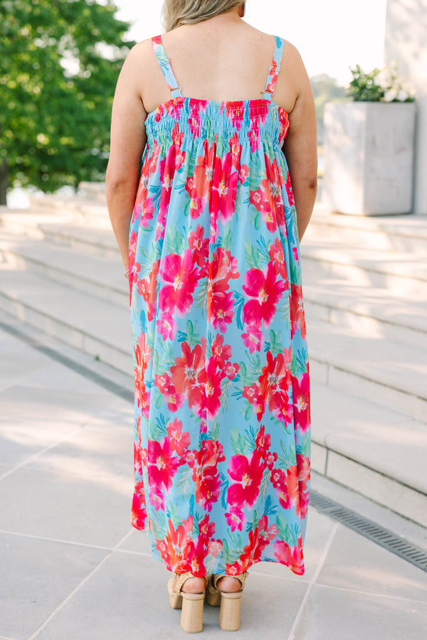 Plus Size tropical floral print maxi dress in light blue with pink and orange flowers.