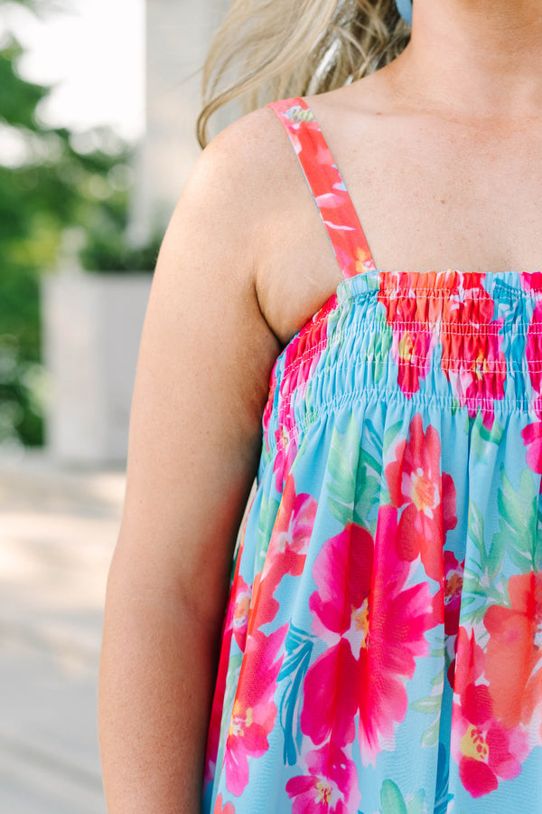 Plus Size tropical floral print maxi dress in light blue with pink and orange flowers.
