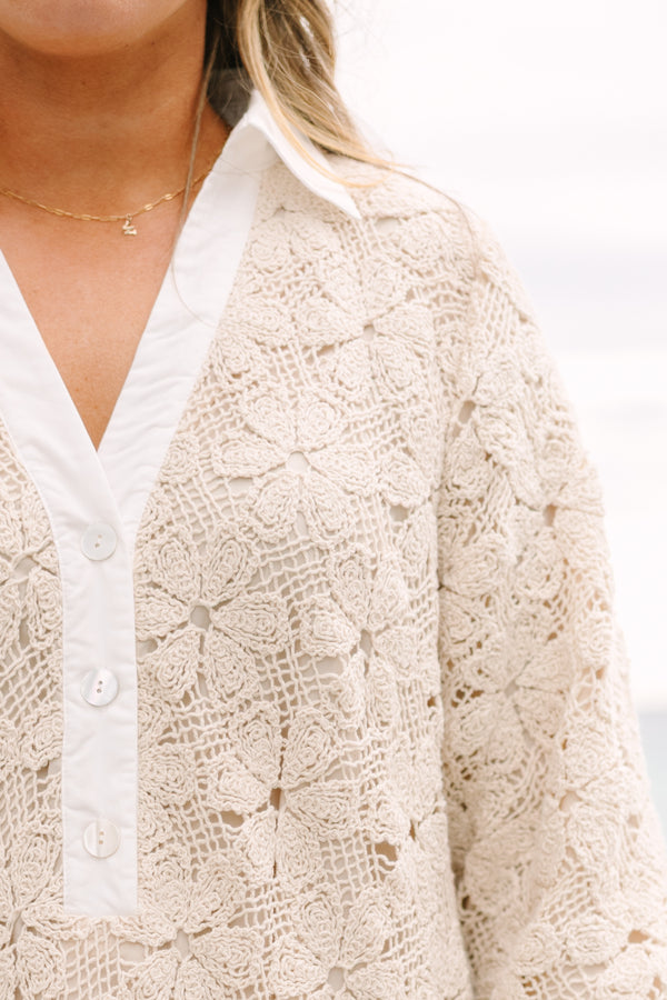 Chic Soul plus size clothing, cream floral lace knee length dress that has long sleeves as well as white cuffs at the end of the sleeves bottom of the dress and along the v-neckline 
