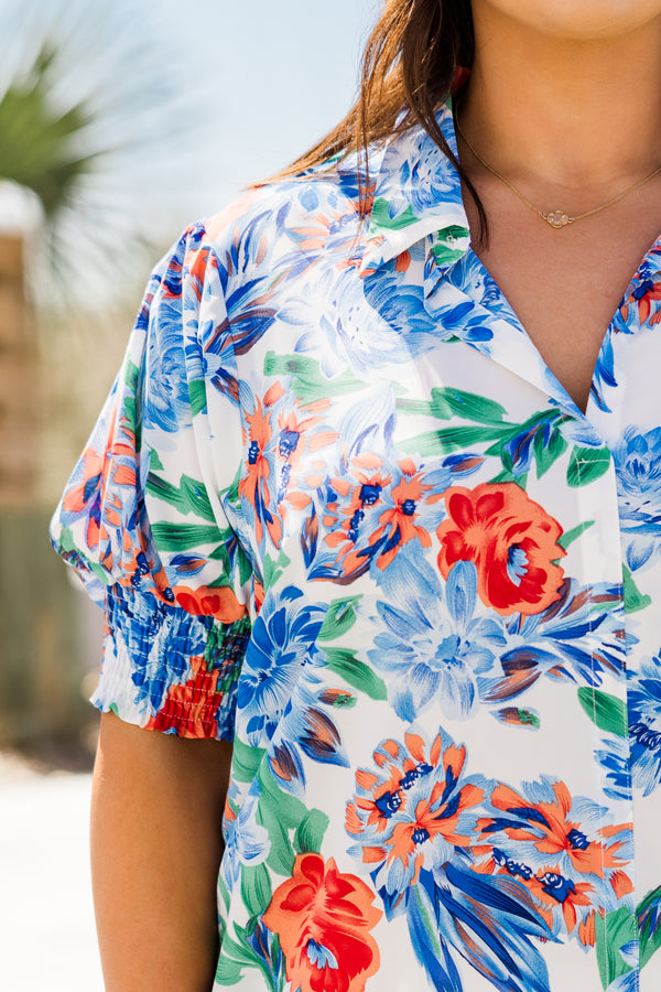 Chic Soul plus size clothing, short-sleeve blue collared buttoned top with a blue and white and orange tropical floral pattern 