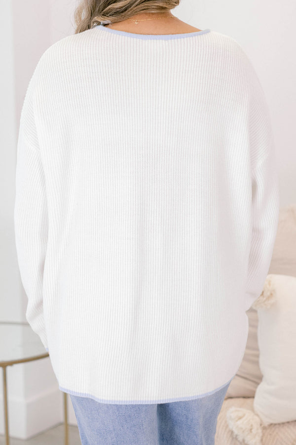 Chic Soul plus size clothing, ivory sweater with long sleeves and a front pocket of the left side of the chest as well as blue stitching details on the end of the sleeves around the neckline bottom of the sweater and outlining the top of the chest pocket 