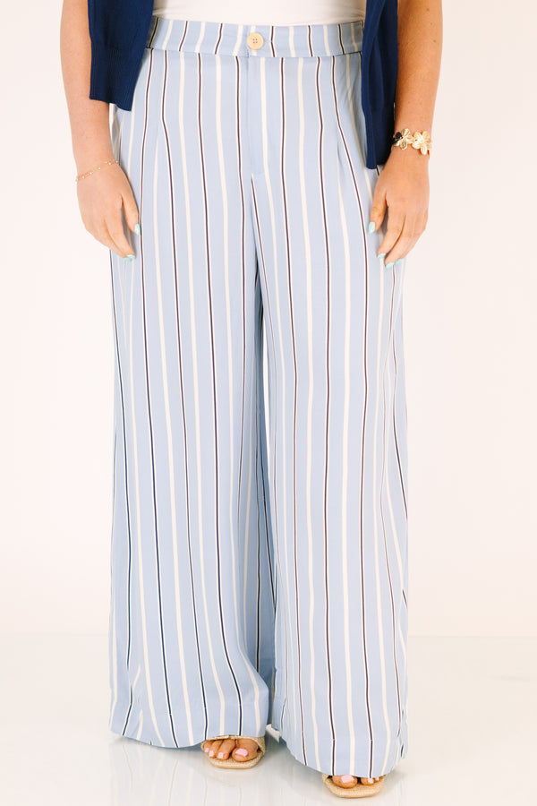 Chic sou plus size clothing, blue striped straight leg pants with pockets and a button in the middle of the waistband 