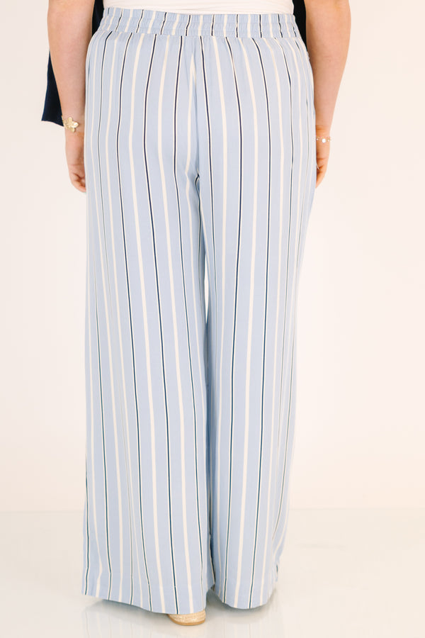 Chic sou plus size clothing, blue striped straight leg pants with pockets and a button in the middle of the waistband 