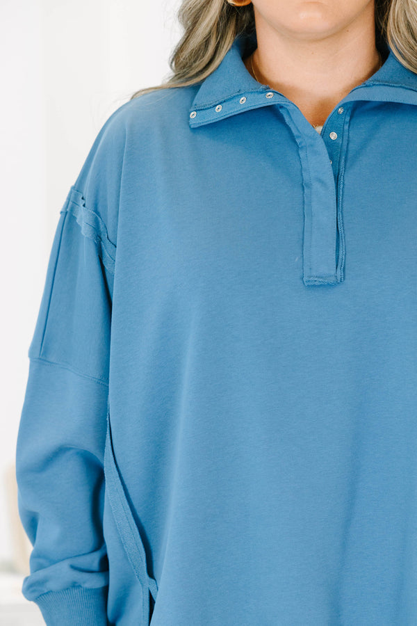 Plus Size blue long-sleeve pullover with a collared snap-button neckline and ribbed trim.