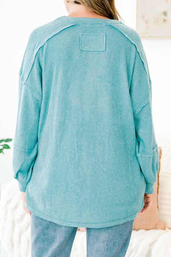 Chic Soul Plus size clothing, teal sweater with long bubble sleeves buttons going down the neckline and stitching details on the sleeves and bottom of the sweater 
