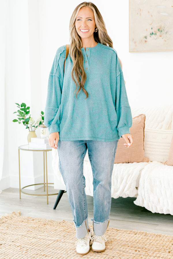 Chic Soul Plus size clothing, teal sweater with long bubble sleeves buttons going down the neckline and stitching details on the sleeves and bottom of the sweater 
