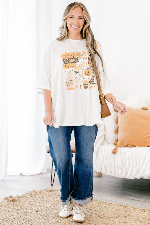 Chic Soul plus size clothing, ivory short sleeve graphic with a graphic in the center of the shirt that has various Halloween objects 
