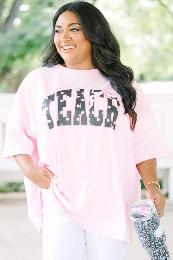 Plus size dusty pink boyfriend tee with polka dot 'TEACH' graphic, oversized 100% cotton fit.