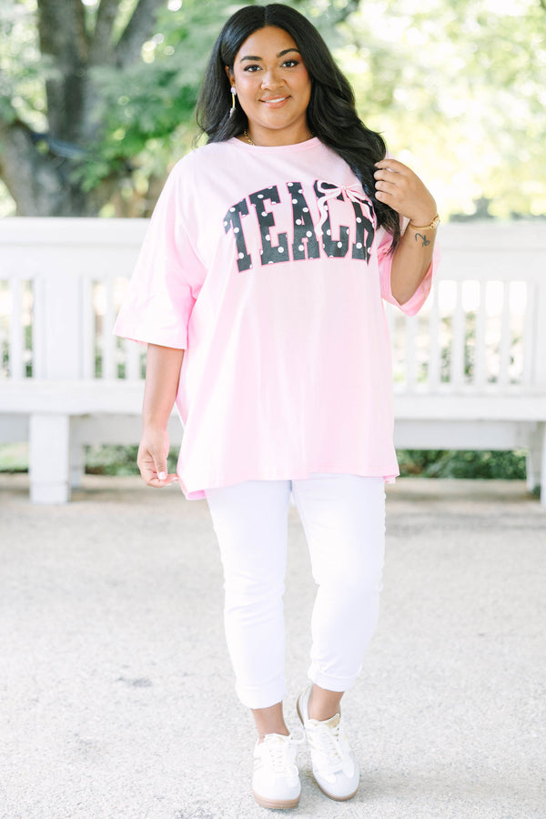 Plus size dusty pink boyfriend tee with polka dot 'TEACH' graphic, oversized 100% cotton fit.