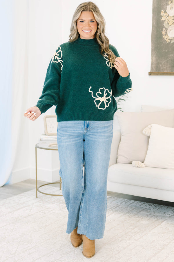 Plus Size medium wash wide-leg jeans with a high-rise fit and raw, frayed hems.