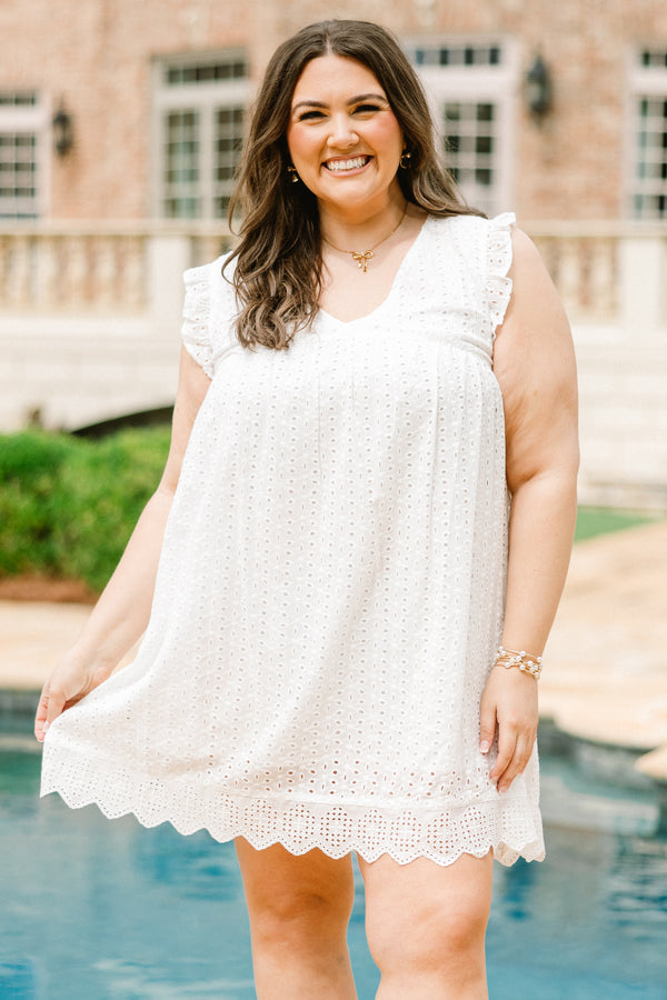 Plus Size white eyelet mini dress with flutter sleeves, a V-neckline, and a scalloped lace hem.
