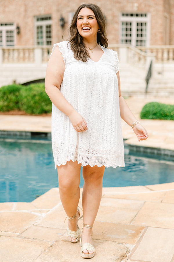 Plus Size white eyelet mini dress with flutter sleeves, a V-neckline, and a scalloped lace hem.