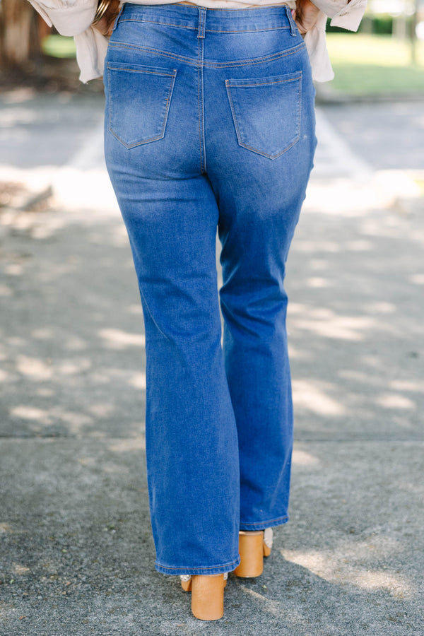 Plus Size medium wash flare jeans with a high-rise fit and classic five-pocket styling.
