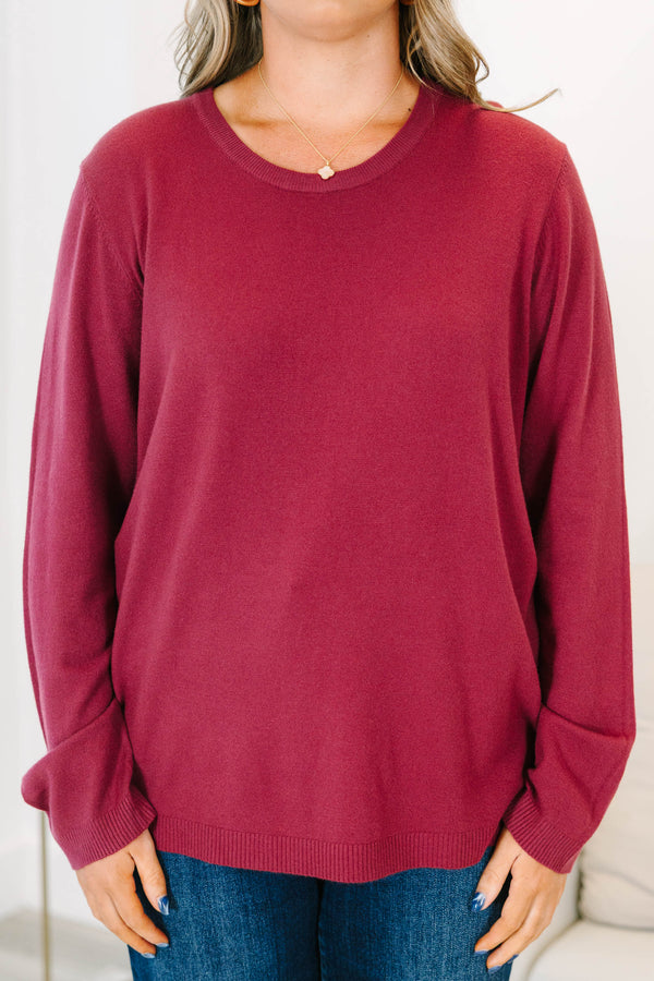Burgundy plus size sweater featuring a relaxed fit and soft, stretchy knit.