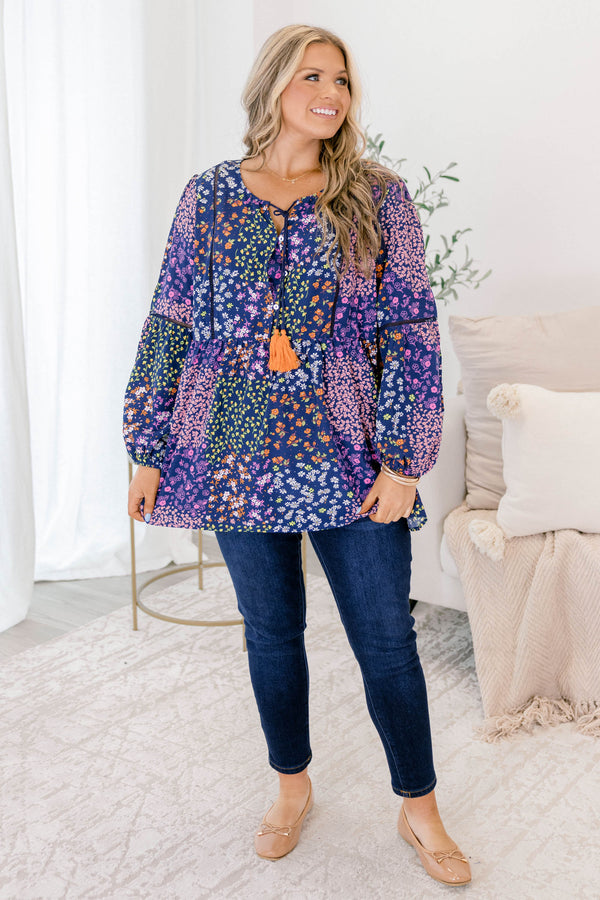 Chic Soul plus size clothing, navy floral long sleeve top with orange tassels hanging from the neckline 
