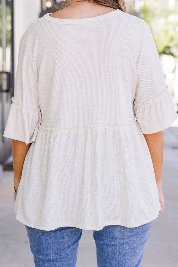 Chic Soul plus size clothing, short sleeve oatmeal babydoll top with round neckline and ruffle detail on sleeves with ruffle detail on bottom of top