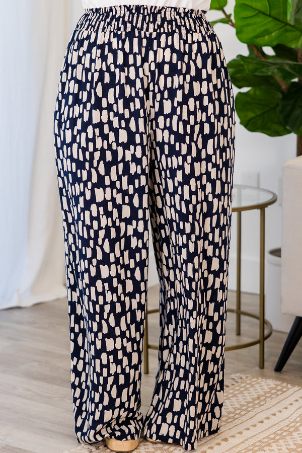 Chic Soul plus size clothing, flowy pants with smocked waist and navy and white pattern