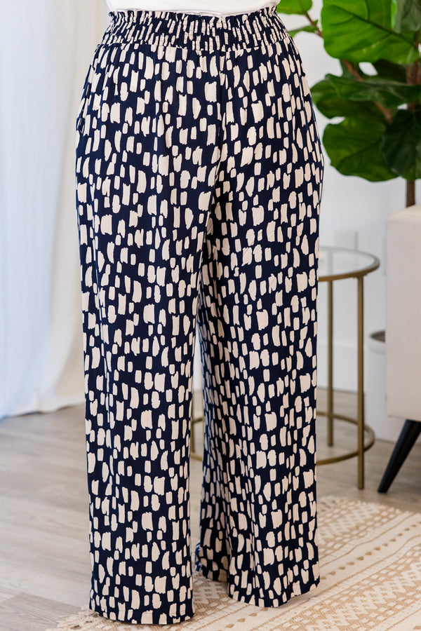 Chic Soul plus size clothing, flowy pants with smocked waist and navy and white pattern